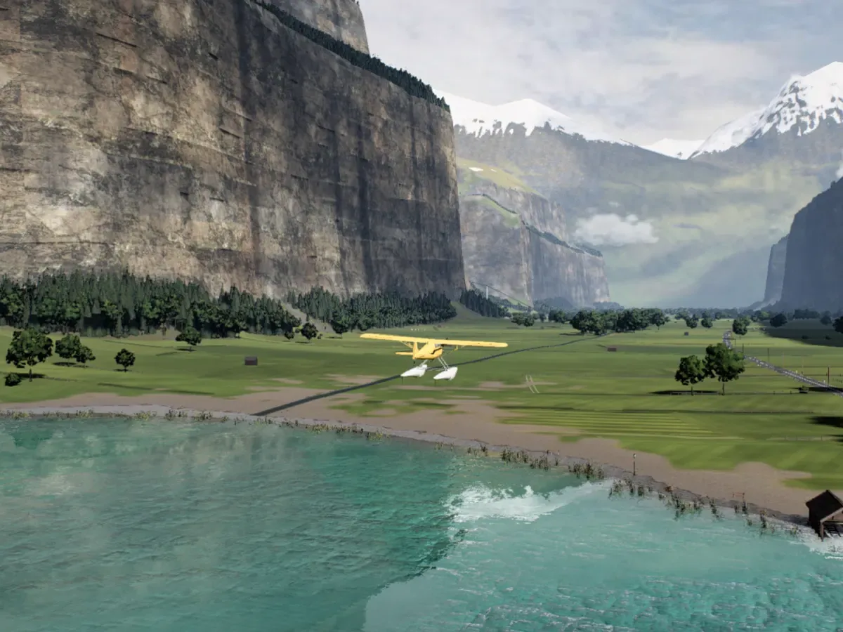The floatplane climbing away from the lake over meadows toward the valley and its snowy peaks.